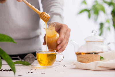 Manuka Honey for Sore Throats & Coughs: Does It Work & At What Strength?